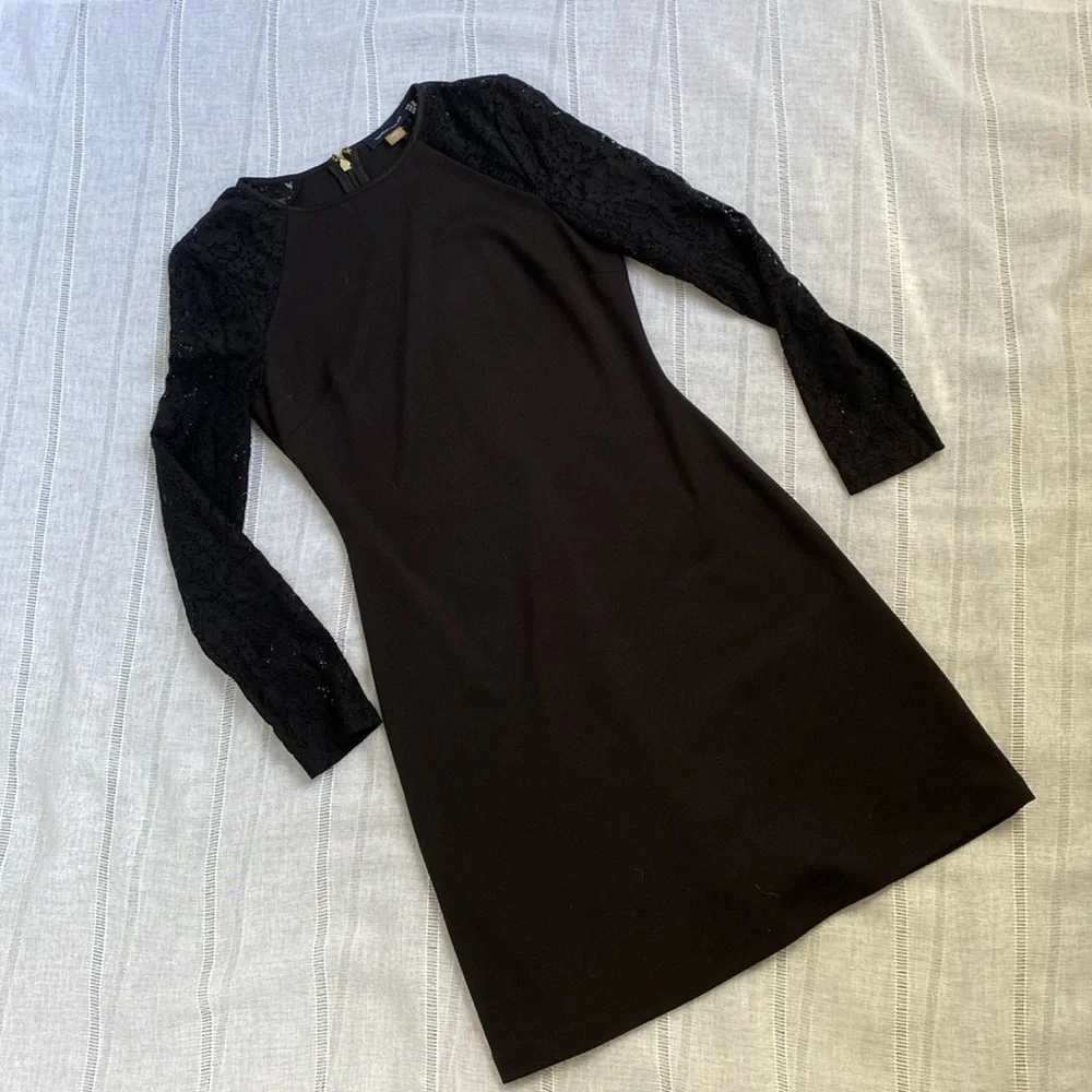 Tommy Hilfiger little black dress with long sleeves lace sleeves.
